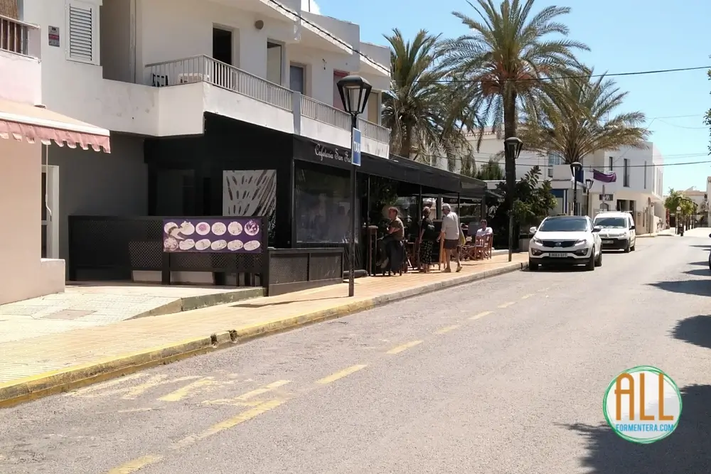 Taxi rank of Sant Francesc with two taxis stopped